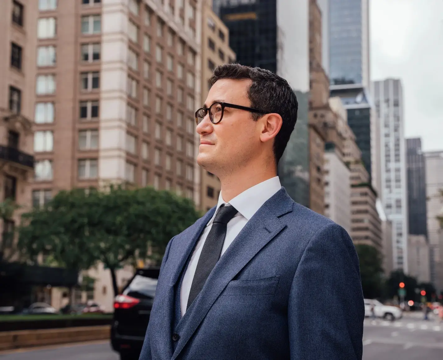 Portrait of Dr. Ben Paul standing on Park Avenue in NYC